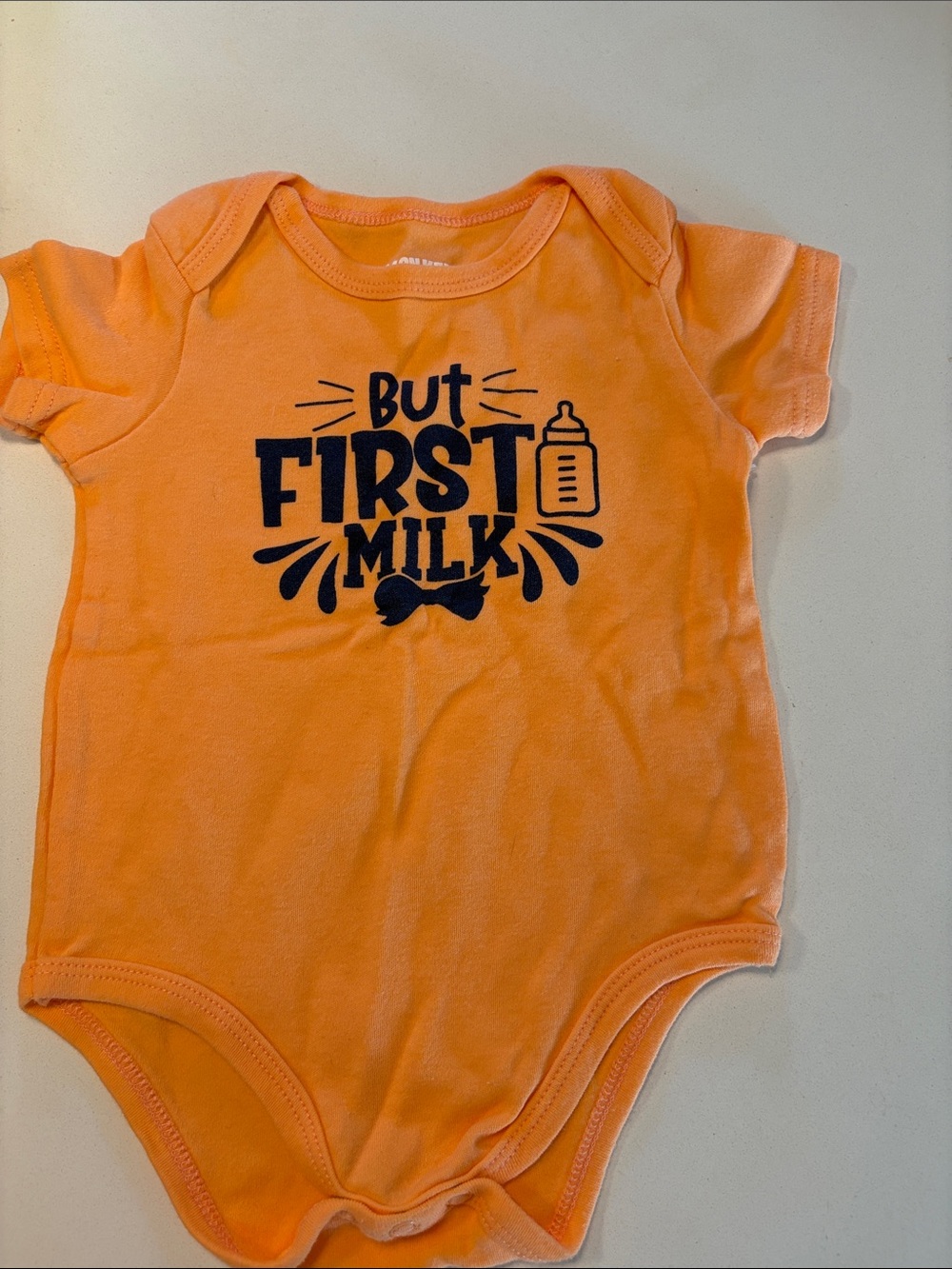 Monkey Bars ‘But First Milk’ Orange Baby Onesie